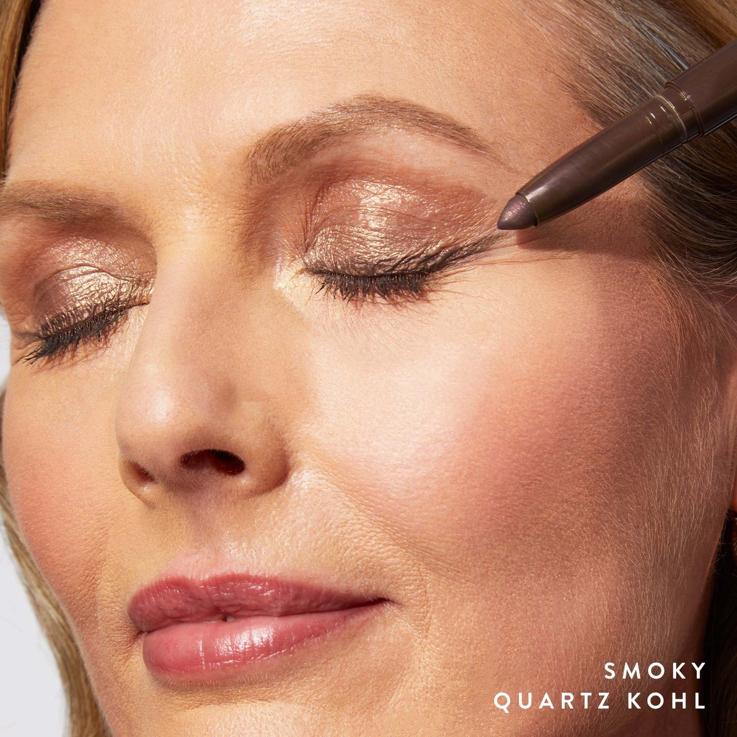 Kajal Longwear Eyeliner model wearing Smoky Quartz Kohl