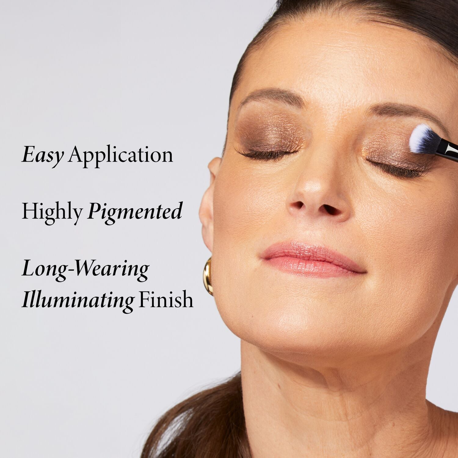 A single green leaf against a white background.