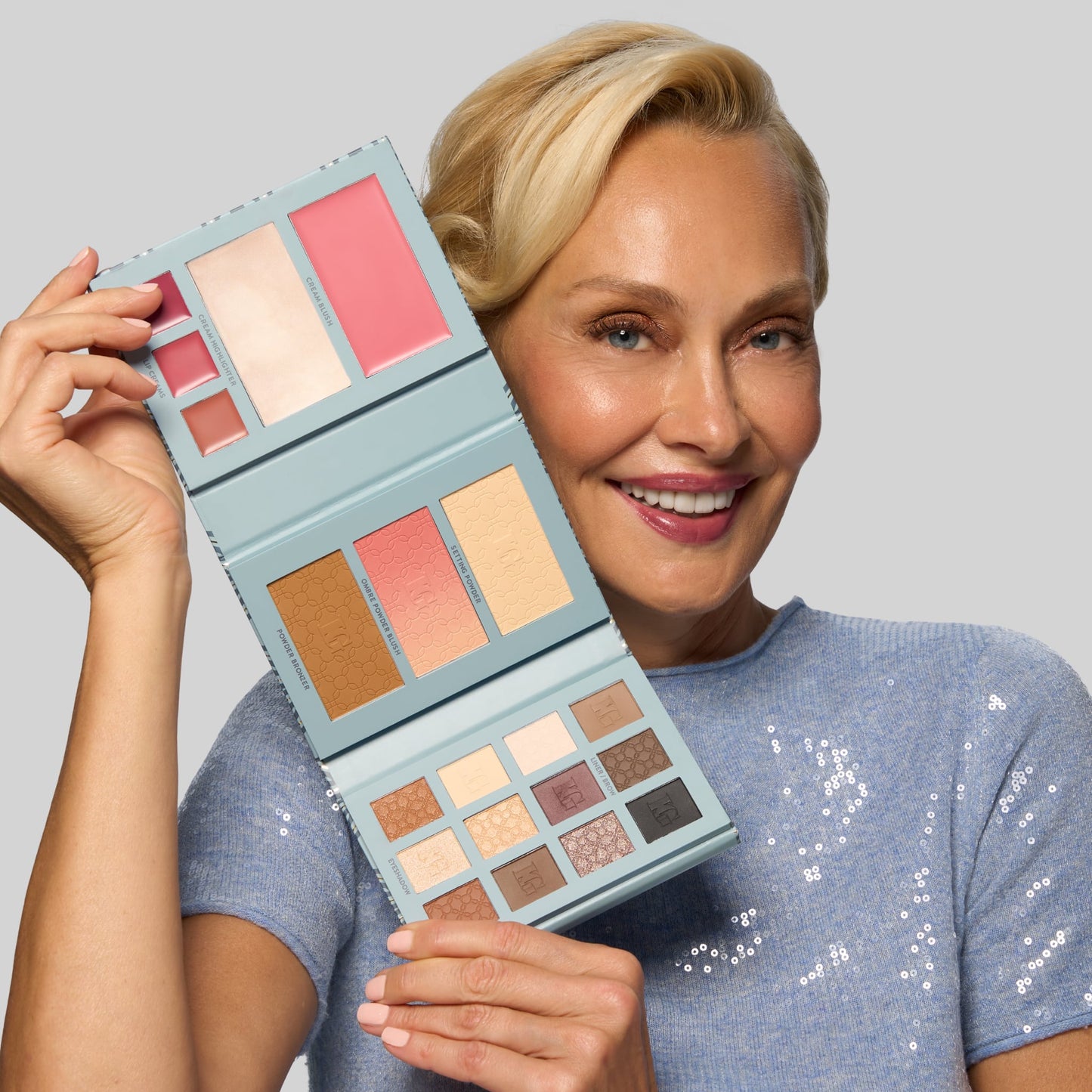 RSVP Ready Big Night Out Full Face Palette model holding product