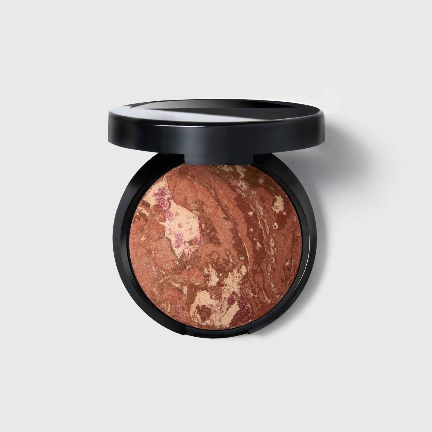 Baked Bronze-n-Brighten Multipurpose Bronzer soldier in Deep
