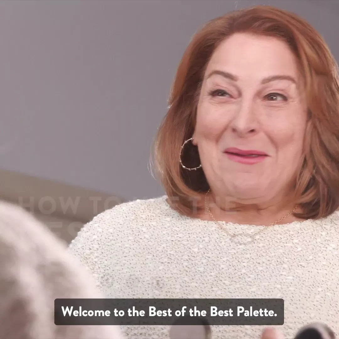 A single green leaf against a white background.