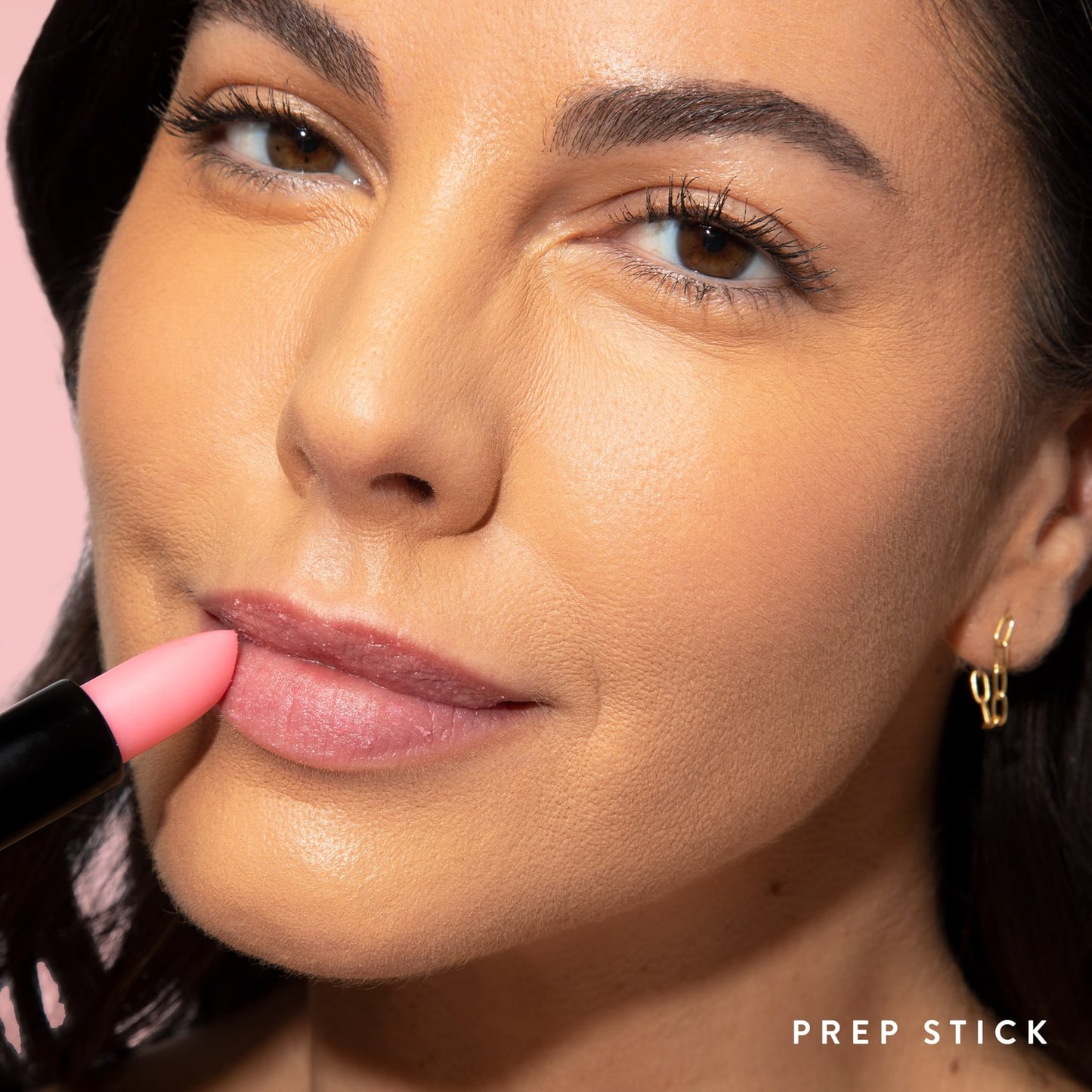 Model wearing Prep Stick Lip Scrub