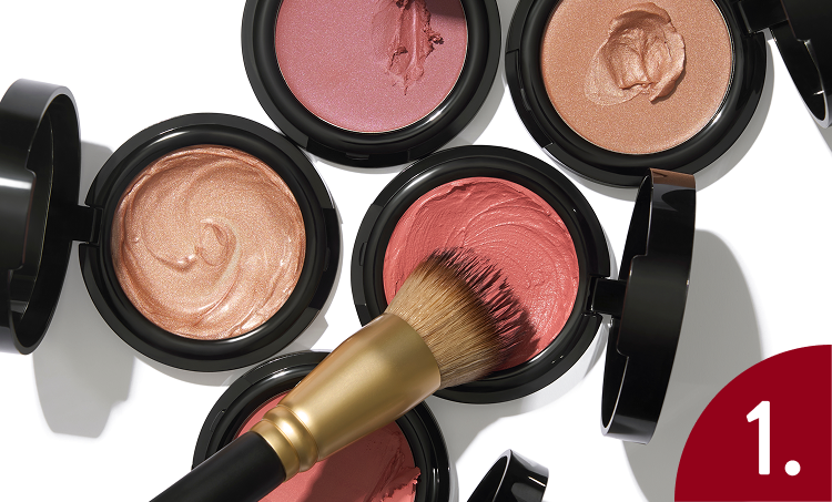 Laura Geller Wonder Balms and brush on a white background