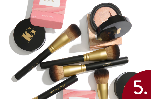 Laura Geller brushes and products on a white background with visible brand name.