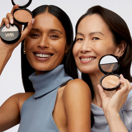 Models holding Baked Balance-n-Brighten Foundation