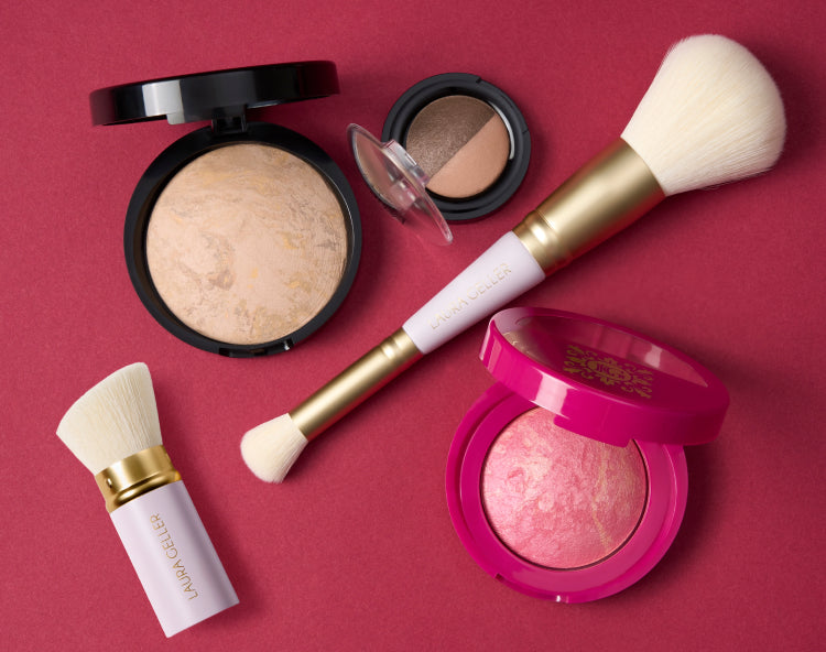 Laura Geller Holiday Daily Routine products on a red background