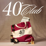 The 40+ Club Tote lifestyle with products in bag