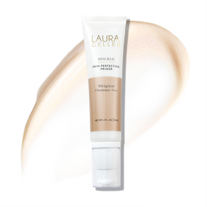 A bottle of Spackle Skin Perfecting Primer in Original Champagne Glow