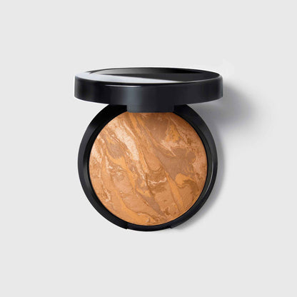 Baked Balance-n-Glow Illuminating Foundation soldier in sand