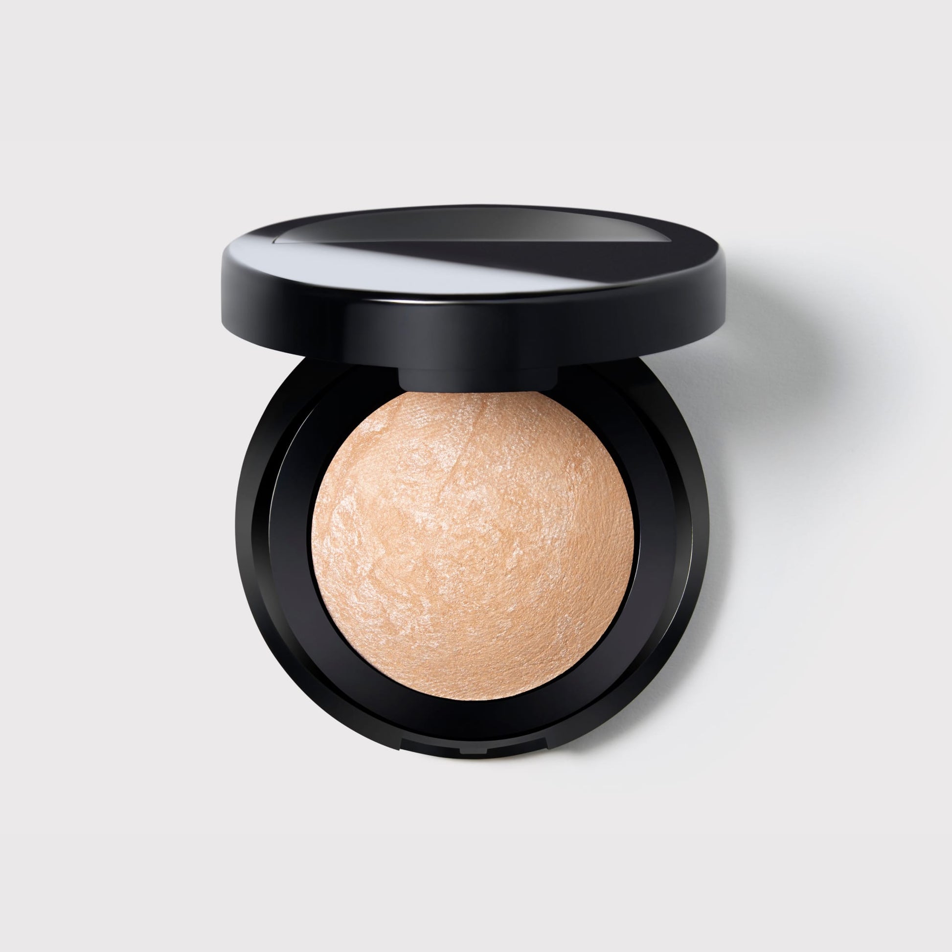 Baked Marbleized Highlighter soldier- prosecco