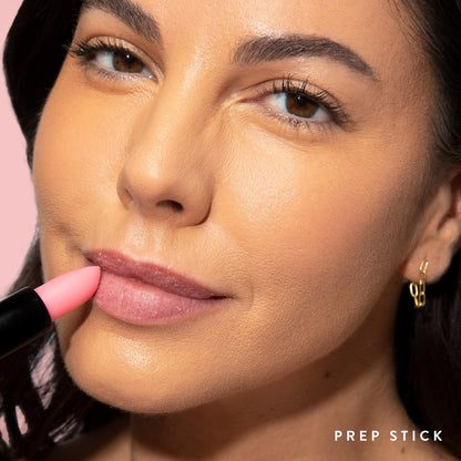 Model wearing Prep Stick Lip Scrub